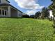 Expansive backyard showing ample green space, perfect for outdoor activities and Gathering enjoyment at 15007 Night Heron Dr, Winter Garden, FL 34787
