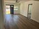 Inviting living area features stylish floors, a sunlit window, and updated fixtures at 1539 Roselawn Sw St, Winter Haven, FL 33880