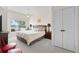 Bright bedroom with ceiling fan, large window, and closet space at 2200 San Vittorino Cir # 105, Kissimmee, FL 34741