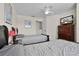 Bedroom with twin beds, a TV, ceiling fan, and closet at 2200 San Vittorino Cir # 105, Kissimmee, FL 34741