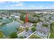 Aerial view of attractive townhome buildings with dedicated parking in a well-maintained community at 2200 San Vittorino Cir # 105, Kissimmee, FL 34741