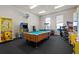 Fun-filled game room featuring a pool table, arcade games, and bright lighting at 2200 San Vittorino Cir # 105, Kissimmee, FL 34741