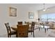 Cozy living room and dining area offers a warm and inviting atmosphere at 2200 San Vittorino Cir # 105, Kissimmee, FL 34741