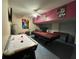 Basement game room featuring an air hockey table, a pool table, and a foosball table at 2677 Emerald Island Blvd, Kissimmee, FL 34747