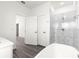 Open bath featuring a soaker tub and tiled shower with sleek fixtures and bright lighting at 2700 Sw 162Nd St Rd, Ocala, FL 34473
