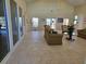 Bright community center room featuring neutral tones, tiled floor, and comfortable seating at 2706 Club Cortile Cir, Kissimmee, FL 34746