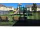 Community playground featuring new turf, benches, a slide, and climbing equipment at 2706 Club Cortile Cir, Kissimmee, FL 34746