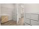 Walk-in closet leading to en-suite bathroom with storage and wire shelving at 2719 River Creek Ln, St Cloud, FL 34771