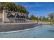 Del Webb Sunbridge community sign with a cascading waterfall feature at 2719 River Creek Ln, St Cloud, FL 34771