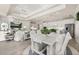 Bright, open-concept living space with hardwood floors, modern lighting, and a spacious kitchen at 2719 River Creek Ln, St Cloud, FL 34771