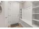 Organized mudroom with a built-in bench, cubbies and storage shelves at 2719 River Creek Ln, St Cloud, FL 34771