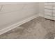 Unfinished walk-in closet with carpeted floors and shelving at 2719 River Creek Ln, St Cloud, FL 34771