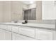 Bathroom vanity with white cabinets, chrome faucet, and a white countertop at 2768 Matera Dr, St Cloud, FL 34771