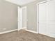 Bedroom with carpet, base trim and closets at 2768 Matera Dr, St Cloud, FL 34771