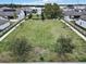 Aerial photo of the community park, which features a large green space, trees, walking paths, and benches at 2768 Matera Dr, St Cloud, FL 34771