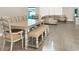 Open dining area connected to the living space, offering ample seating and natural light at 2768 Matera Dr, St Cloud, FL 34771