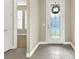 Bright entryway with decorative glass door and tile flooring that leads to the rest of the home at 2768 Matera Dr, St Cloud, FL 34771