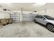 Spacious two car garage with side entry car parked to the right at 2768 Matera Dr, St Cloud, FL 34771