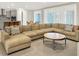 Spacious living room blending seamlessly with the kitchen, creating an ideal space for gatherings at 2768 Matera Dr, St Cloud, FL 34771
