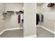 Walk-in closet with wire shelving and tile floors, offering ample storage space at 2768 Matera Dr, St Cloud, FL 34771