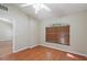 Comfortable bedroom with wood flooring, window, and a ceiling fan for added air circulation at 2804 Latter Day Ct, St Cloud, FL 34769