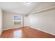 This bedroom offers natural light and laminate flooring at 2804 Latter Day Ct, St Cloud, FL 34769