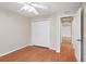 Bedroom with ceiling fan, double closets and hallway access at 2804 Latter Day Ct, St Cloud, FL 34769