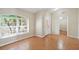 Inviting foyer with tile flooring, a bright window, and a view into other living spaces at 2804 Latter Day Ct, St Cloud, FL 34769