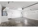 Garage featuring white walls, concrete floor, and access doors at 2804 Latter Day Ct, St Cloud, FL 34769