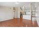 Spacious living room with wood-look flooring, neutral walls, and an open layout, creating a welcoming atmosphere at 2804 Latter Day Ct, St Cloud, FL 34769