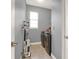 Efficient laundry room with modern washer, dryer, and storage space at 3005 Crispin Cir, Harmony, FL 34773