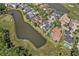 Community aerial view featuring lake and golf course views at 304 Acadia Ln, Celebration, FL 34747