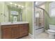 Bathroom featuring green paint, updated lighting and fixtures at 304 Acadia Ln, Celebration, FL 34747