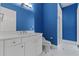 Modern bathroom with a white vanity, toilet, and walk-in shower at 304 Acadia Ln, Celebration, FL 34747