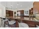Modern kitchen with island and stainless steel appliances, with breakfast bar at 304 Acadia Ln, Celebration, FL 34747