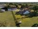 Expansive property featuring home, detached garage, pastures, and mature trees at 3161 Appaloosa Ct, Kissimmee, FL 34746