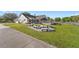 Spacious backyard with stone bench seating, perfect for outdoor entertaining and relaxation at 3161 Appaloosa Ct, Kissimmee, FL 34746