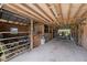 This spacious barn features an open layout, concrete floor, and stall, perfect for various storage or agricultural needs at 3161 Appaloosa Ct, Kissimmee, FL 34746