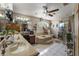Bright bathroom with dual sink vanity, soaking tub, and glass-enclosed shower at 3161 Appaloosa Ct, Kissimmee, FL 34746