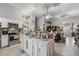 Spacious kitchen with an island that opens to the dining area and living room at 3161 Appaloosa Ct, Kissimmee, FL 34746