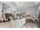 Spacious kitchen with an island that opens to the dining area and living room at 3161 Appaloosa Ct, Kissimmee, FL 34746