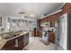 Well-equipped kitchen with stainless steel appliances, custom cabinets, and granite countertops at 3161 Appaloosa Ct, Kissimmee, FL 34746