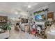 Spacious living room featuring bright light, a fireplace, and open floor plan at 3161 Appaloosa Ct, Kissimmee, FL 34746