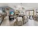 Spacious living room with fireplace, tile floors, and access to the backyard at 3161 Appaloosa Ct, Kissimmee, FL 34746