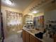 Bright bathroom with a vanity, mirror and decorative shower curtain, ready to move in and enjoy at 3874 Blackberry Cir, St Cloud, FL 34769