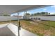 A large backyard with a concrete patio, and privacy fence perfect for relaxation and entertainment at 4548 Cepeda St, Orlando, FL 32811