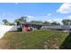 Spacious fenced backyard with lush grass and a shed at 4548 Cepeda St, Orlando, FL 32811