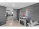 Living room showcasing modern fireplace, stylish decor, and open layout connecting to the kitchen at 4548 Cepeda St, Orlando, FL 32811
