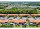 Planned community with colorful townhomes and a bright-blue pin marking the listing location at 4743 Vero Beach Pl, Kissimmee, FL 34746