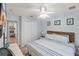 Comfortable bedroom with a double bed, closet, ceiling fan, and adjoining room with bunk beds at 4743 Vero Beach Pl, Kissimmee, FL 34746